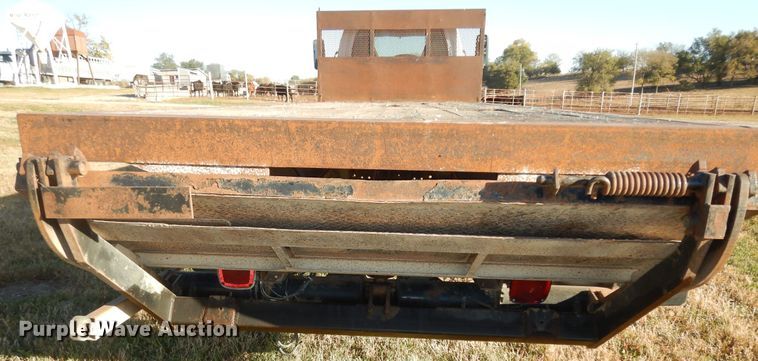 image for item DI6753 2004 GMC C7500  flatbed truck
