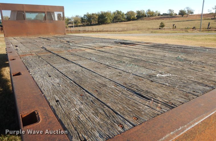 image for item DI6753 2004 GMC C7500  flatbed truck