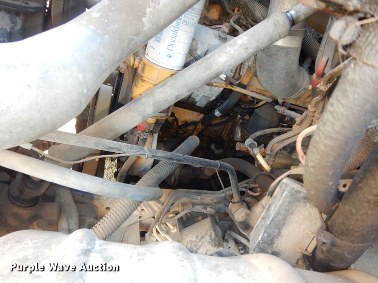 image for item DI6753 2004 GMC C7500  flatbed truck