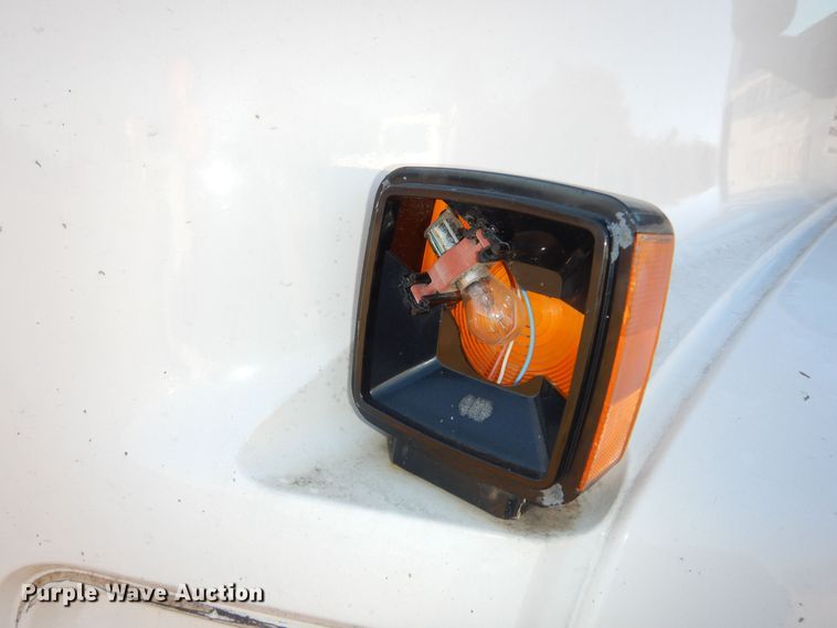 image for item DI6753 2004 GMC C7500  flatbed truck