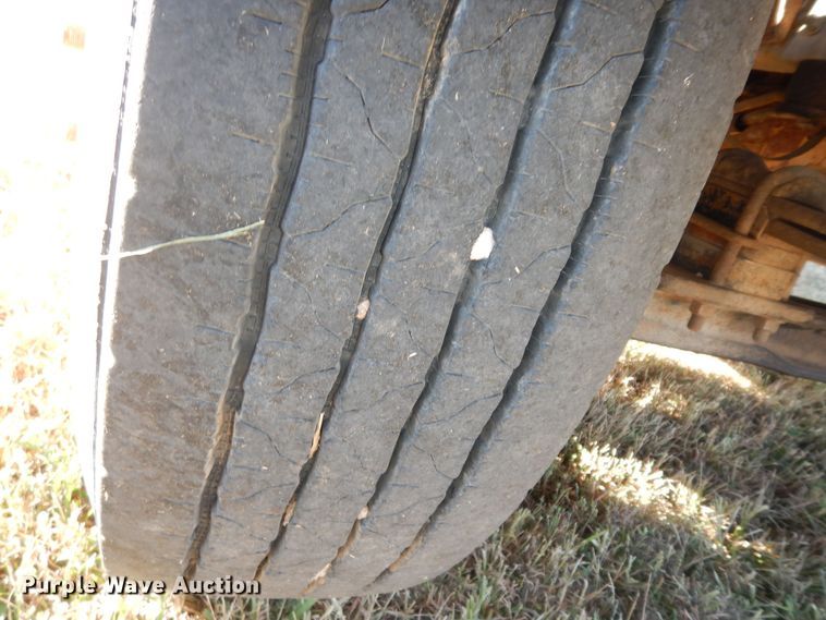 image for item DI6753 2004 GMC C7500  flatbed truck