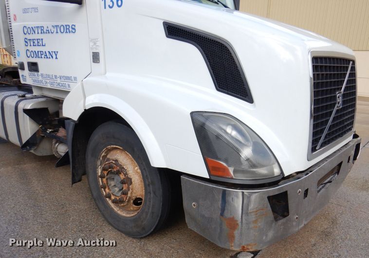 image for item JL9907 2011 Volvo VNL semi truck