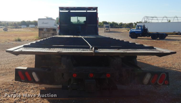 image for item KO9918 2005 Mack CV713  rollback truck