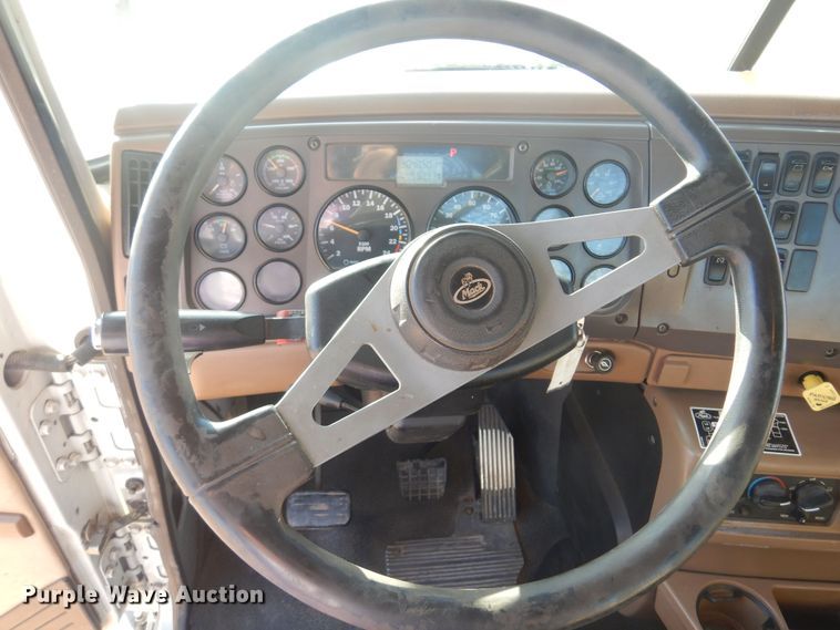 image for item KO9918 2005 Mack CV713  rollback truck