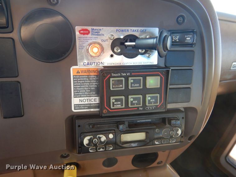 image for item KO9918 2005 Mack CV713  rollback truck