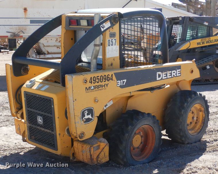 image for item DF8135 2009 John Deere 317  skid steer loader