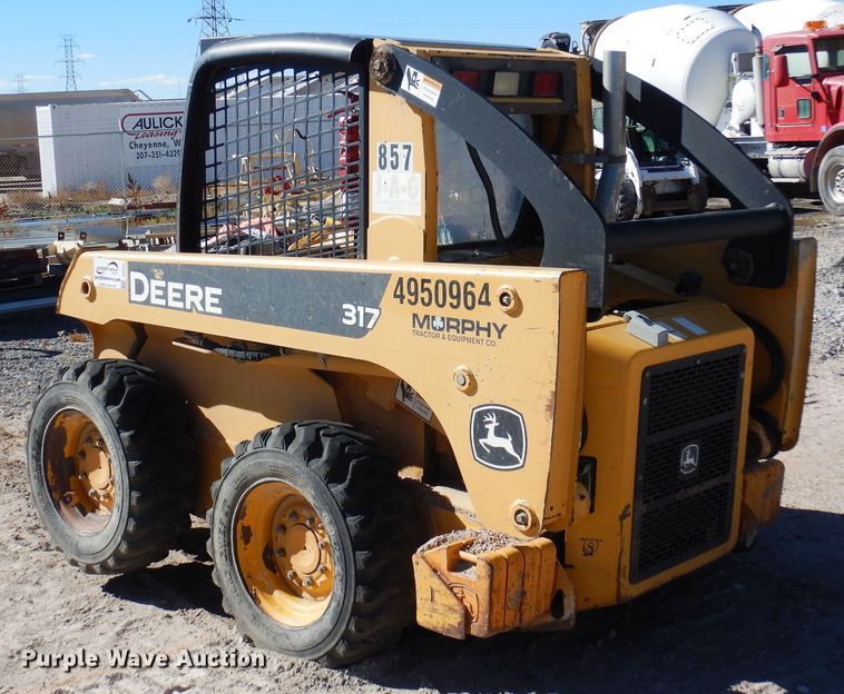 image for item DF8135 2009 John Deere 317  skid steer loader