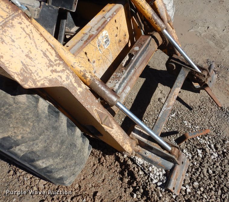 image for item DF8136 1995 John Deere 7775  skid steer loader