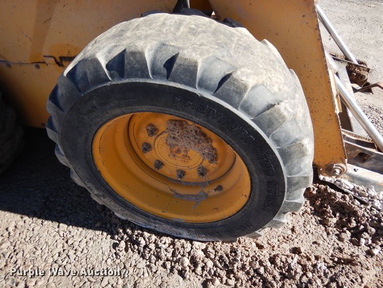 image for item DF8136 1995 John Deere 7775  skid steer loader