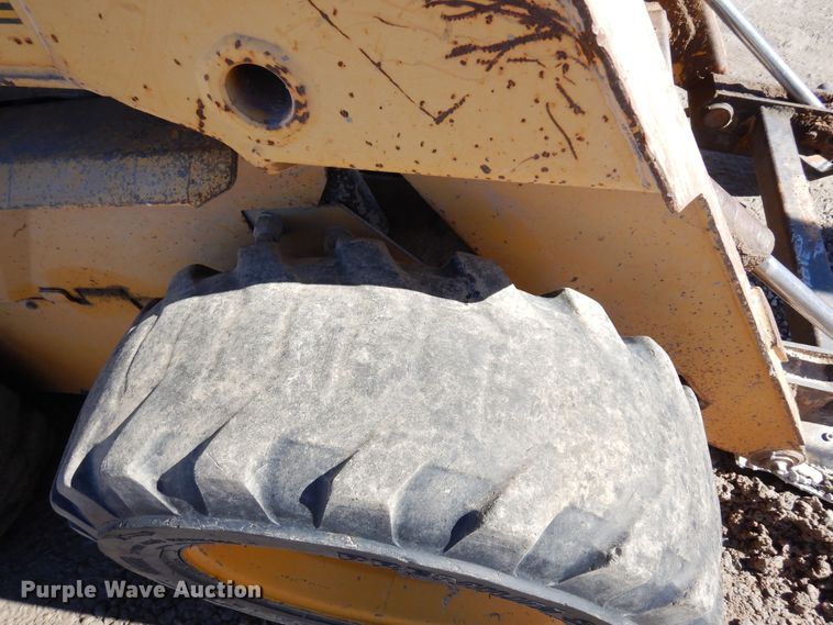 image for item DF8136 1995 John Deere 7775  skid steer loader