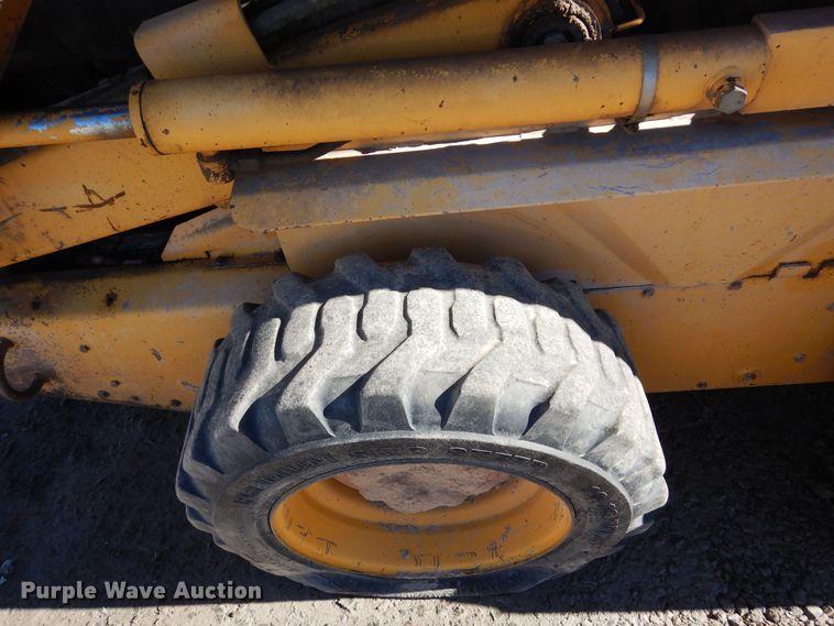 image for item DF8136 1995 John Deere 7775  skid steer loader