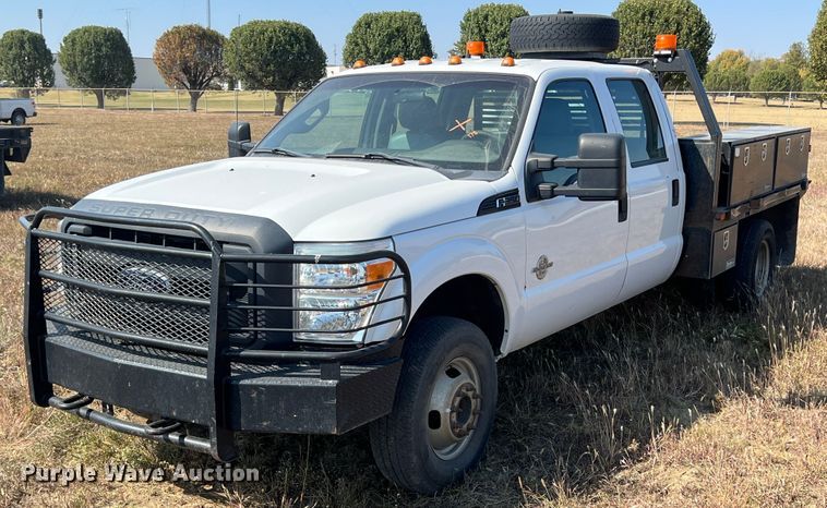 image for item KF9900 2012 Ford F350 Super Duty  Crew Cab flatbed pickup truck