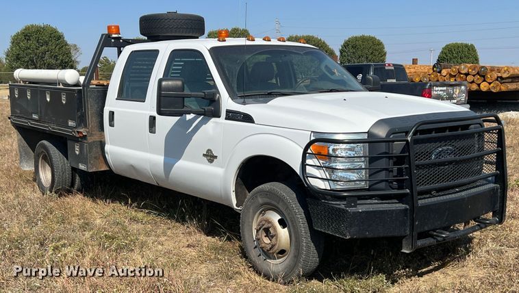 image for item KF9900 2012 Ford F350 Super Duty  Crew Cab flatbed pickup truck
