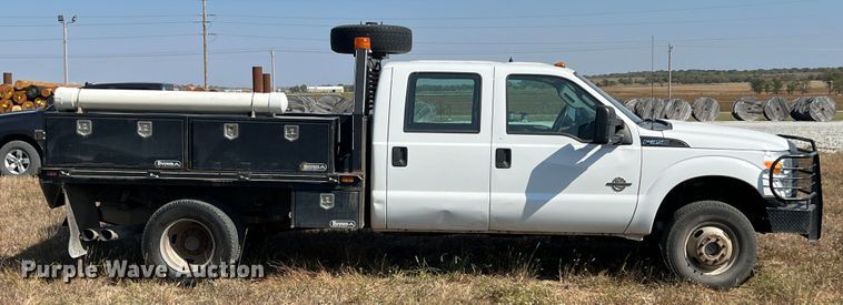 image for item KF9900 2012 Ford F350 Super Duty  Crew Cab flatbed pickup truck
