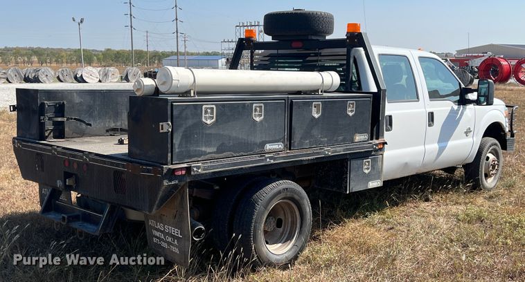 image for item KF9900 2012 Ford F350 Super Duty  Crew Cab flatbed pickup truck