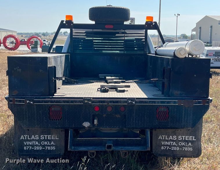 image for item KF9900 2012 Ford F350 Super Duty  Crew Cab flatbed pickup truck