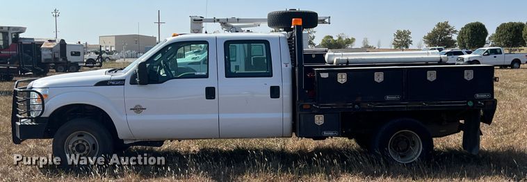 image for item KF9900 2012 Ford F350 Super Duty  Crew Cab flatbed pickup truck