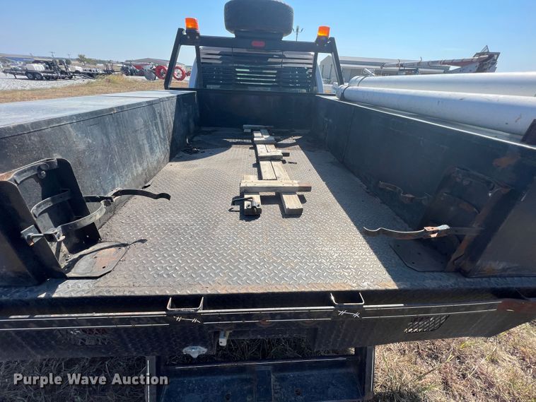 image for item KF9900 2012 Ford F350 Super Duty  Crew Cab flatbed pickup truck