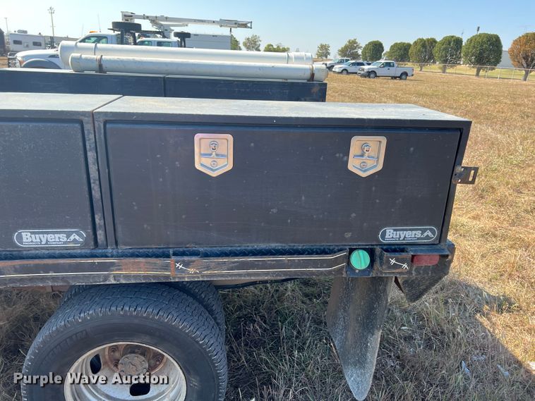 image for item KF9900 2012 Ford F350 Super Duty  Crew Cab flatbed pickup truck