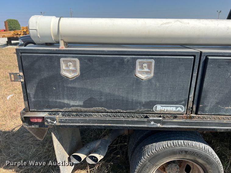 image for item KF9900 2012 Ford F350 Super Duty  Crew Cab flatbed pickup truck