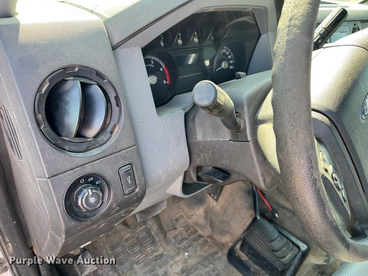 image for item KF9900 2012 Ford F350 Super Duty  Crew Cab flatbed pickup truck