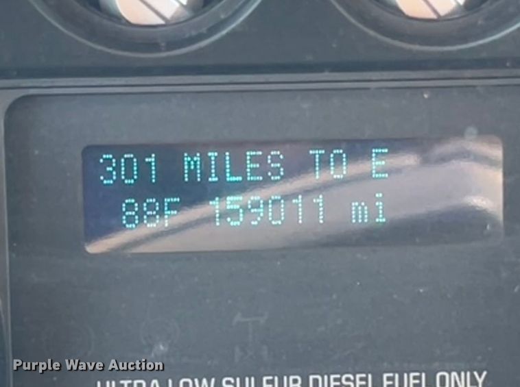 image for item KF9900 2012 Ford F350 Super Duty  Crew Cab flatbed pickup truck