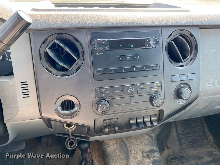 image for item KF9900 2012 Ford F350 Super Duty  Crew Cab flatbed pickup truck