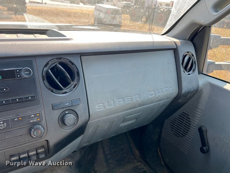 image for item KF9900 2012 Ford F350 Super Duty  Crew Cab flatbed pickup truck