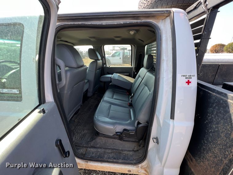 image for item KF9900 2012 Ford F350 Super Duty  Crew Cab flatbed pickup truck