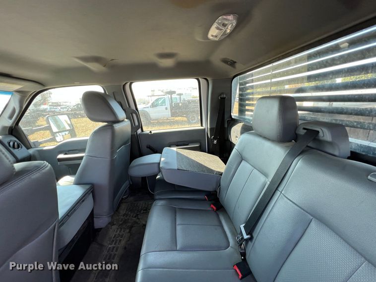 image for item KF9900 2012 Ford F350 Super Duty  Crew Cab flatbed pickup truck