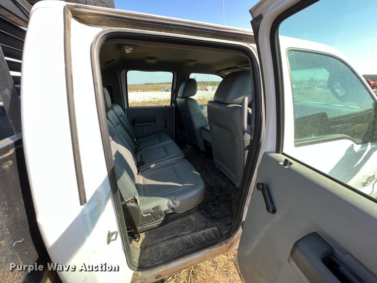 image for item KF9900 2012 Ford F350 Super Duty  Crew Cab flatbed pickup truck