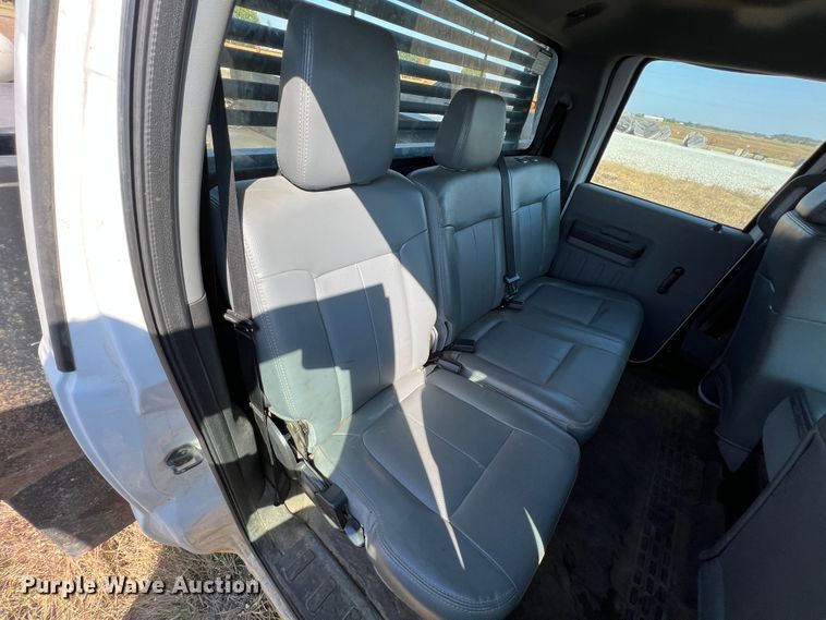 image for item KF9900 2012 Ford F350 Super Duty  Crew Cab flatbed pickup truck