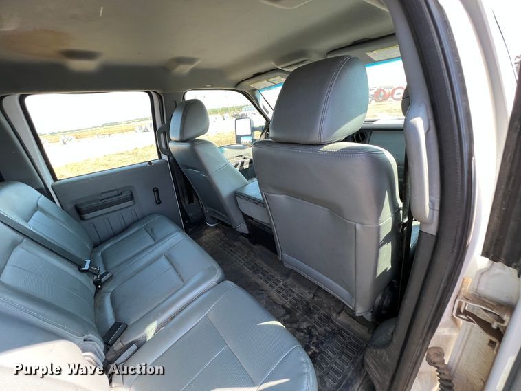 image for item KF9900 2012 Ford F350 Super Duty  Crew Cab flatbed pickup truck