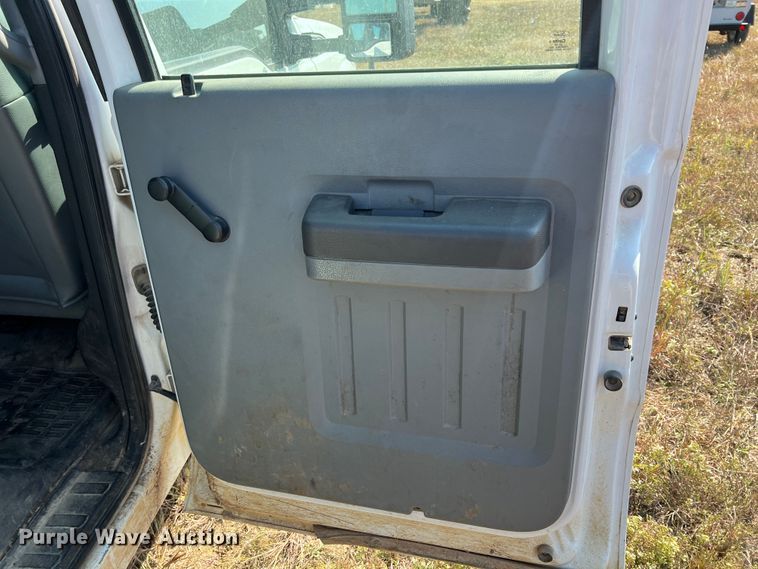 image for item KF9900 2012 Ford F350 Super Duty  Crew Cab flatbed pickup truck