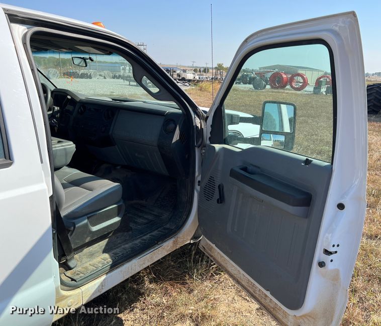 image for item KF9900 2012 Ford F350 Super Duty  Crew Cab flatbed pickup truck