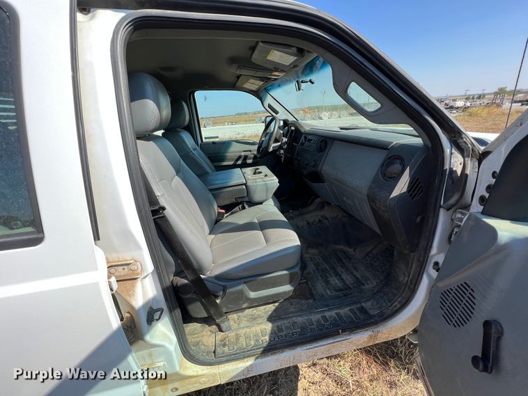 image for item KF9900 2012 Ford F350 Super Duty  Crew Cab flatbed pickup truck