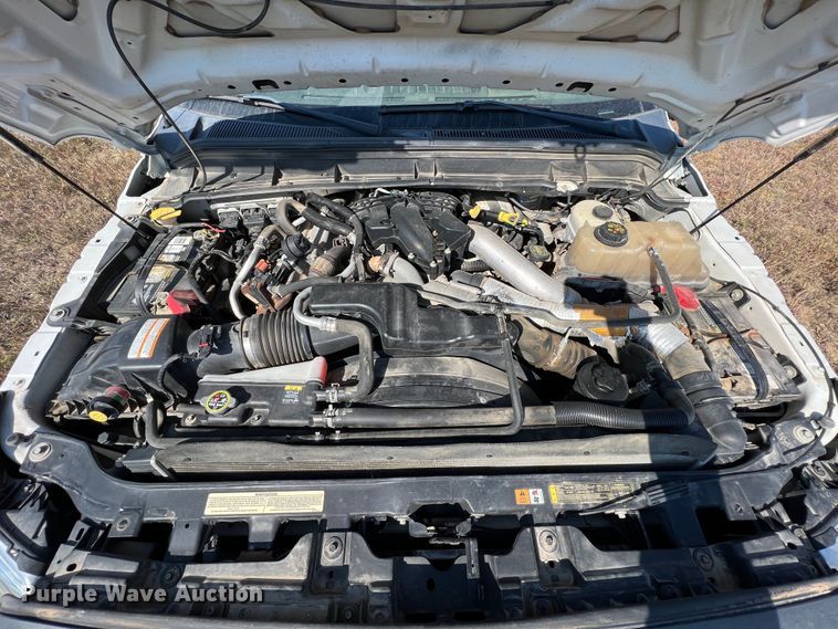 image for item KF9900 2012 Ford F350 Super Duty  Crew Cab flatbed pickup truck