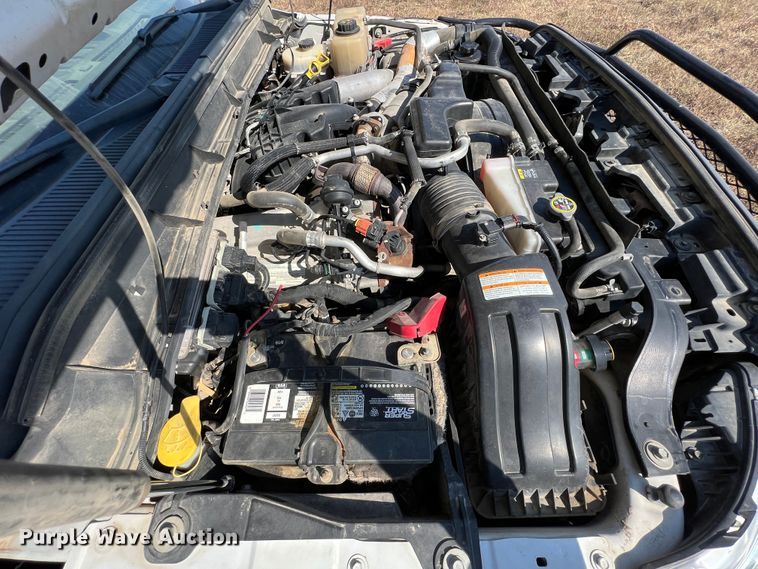 image for item KF9900 2012 Ford F350 Super Duty  Crew Cab flatbed pickup truck