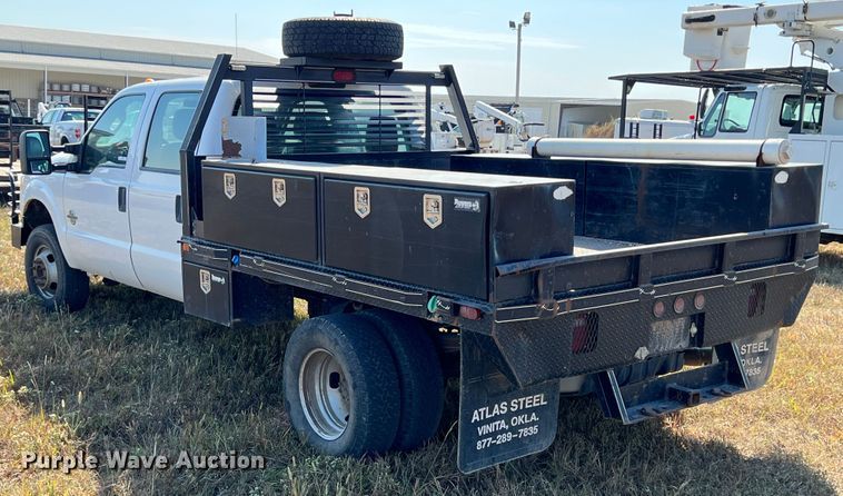 image for item KF9902 2015 Ford F350 Super Duty  Crew Cab flatbed pickup truck