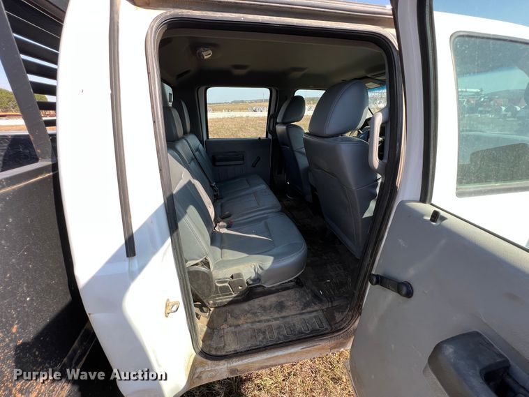 image for item KF9902 2015 Ford F350 Super Duty  Crew Cab flatbed pickup truck