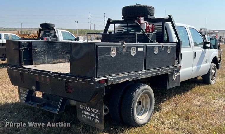 image for item KF9907 2015 Ford F350 Super Duty  Crew Cab flatbed pickup truck