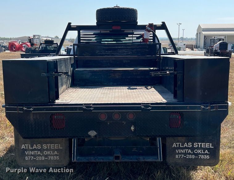 image for item KF9907 2015 Ford F350 Super Duty  Crew Cab flatbed pickup truck