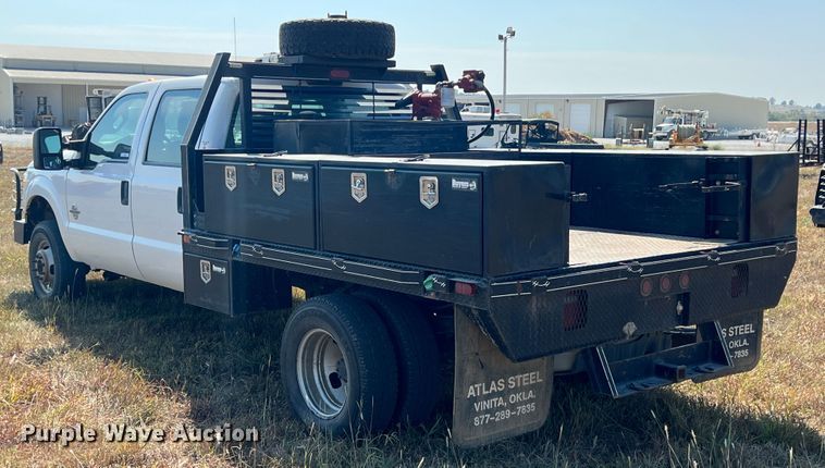 image for item KF9907 2015 Ford F350 Super Duty  Crew Cab flatbed pickup truck