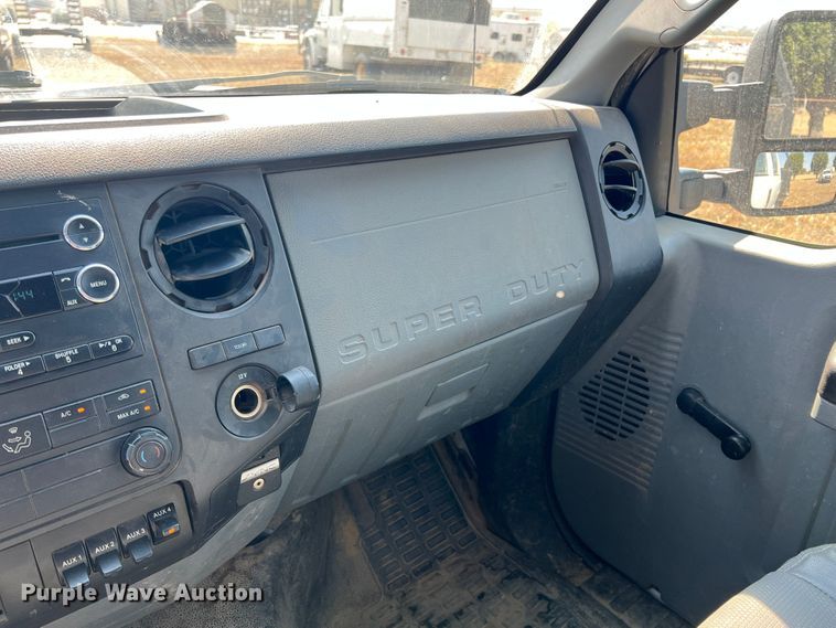 image for item KF9907 2015 Ford F350 Super Duty  Crew Cab flatbed pickup truck