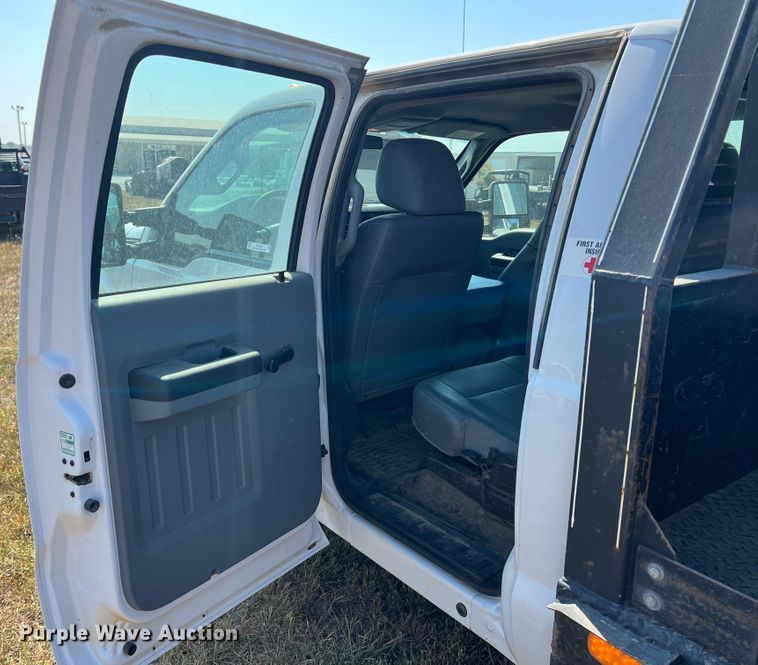 image for item KF9907 2015 Ford F350 Super Duty  Crew Cab flatbed pickup truck