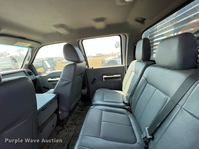 image for item KF9907 2015 Ford F350 Super Duty  Crew Cab flatbed pickup truck