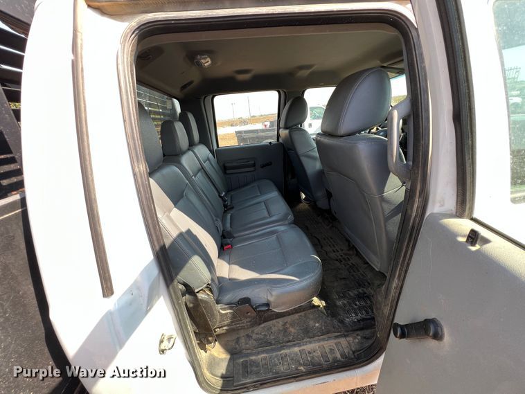 image for item KF9907 2015 Ford F350 Super Duty  Crew Cab flatbed pickup truck