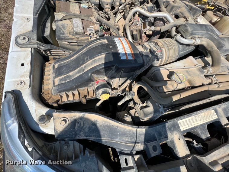 image for item KF9907 2015 Ford F350 Super Duty  Crew Cab flatbed pickup truck