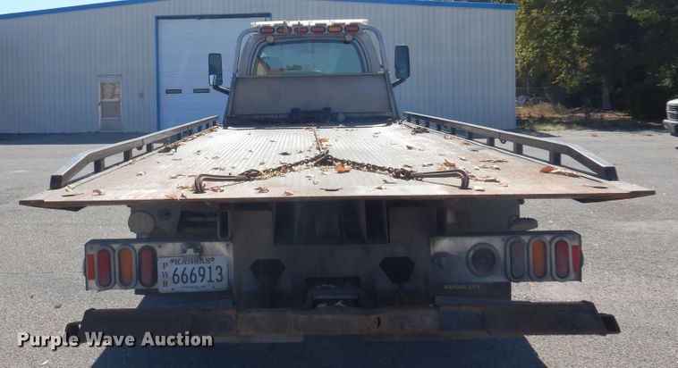image for item KJ9163 2009 GMC C5500  rollback truck
