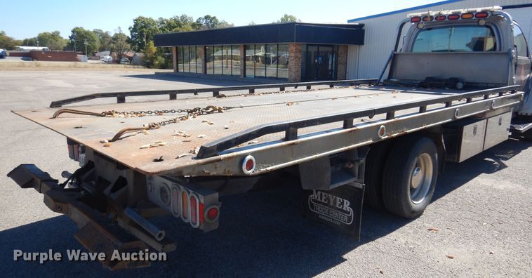 image for item KJ9163 2009 GMC C5500  rollback truck